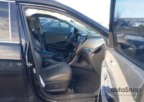 2015 Hyundai Santa Fe Sport 2.4L z USA, uszkodzony, nr VIN 5XYZUDLB0FG244699